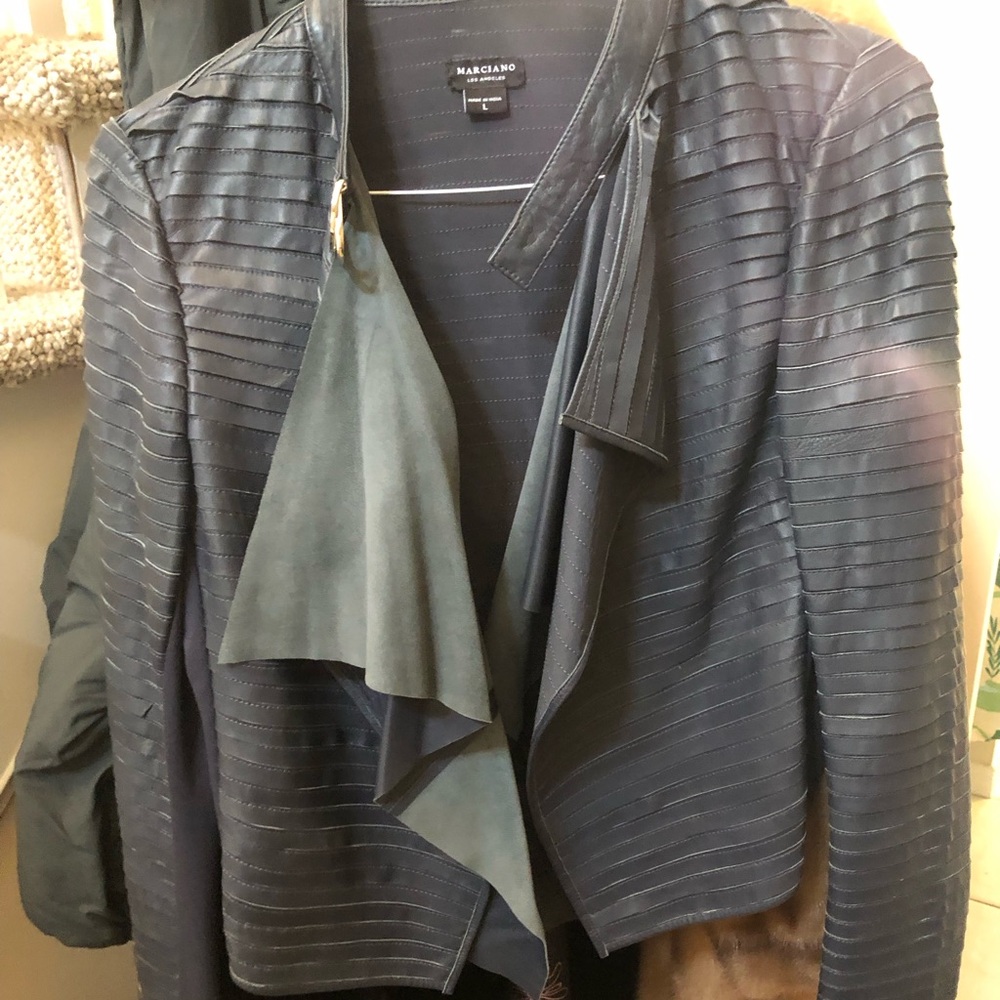 Soft leather light jacket- It’s stretchy! And has a flattering waterfall style